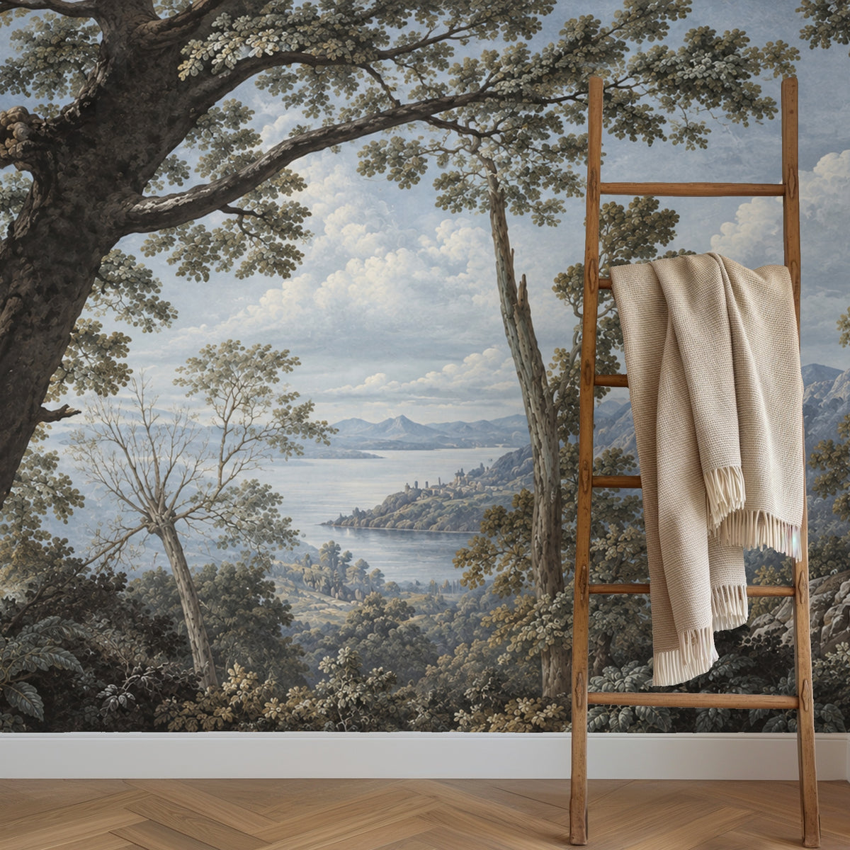 Entryway styling: mural behind a textured credenza and ceramic lamp, highlighting mid-distance trees and hills