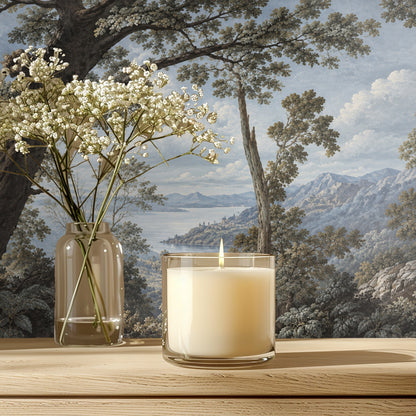 Bedroom installation: bed and round mirror with the mural forming a serene headboard view
