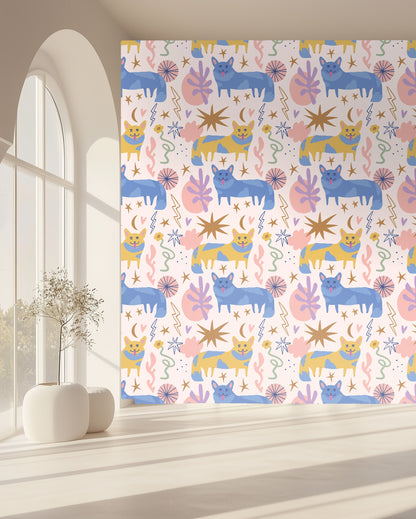 High-resolution swatch close-up focusing on two adjacent cat motifs and surrounding starbursts and leaves.