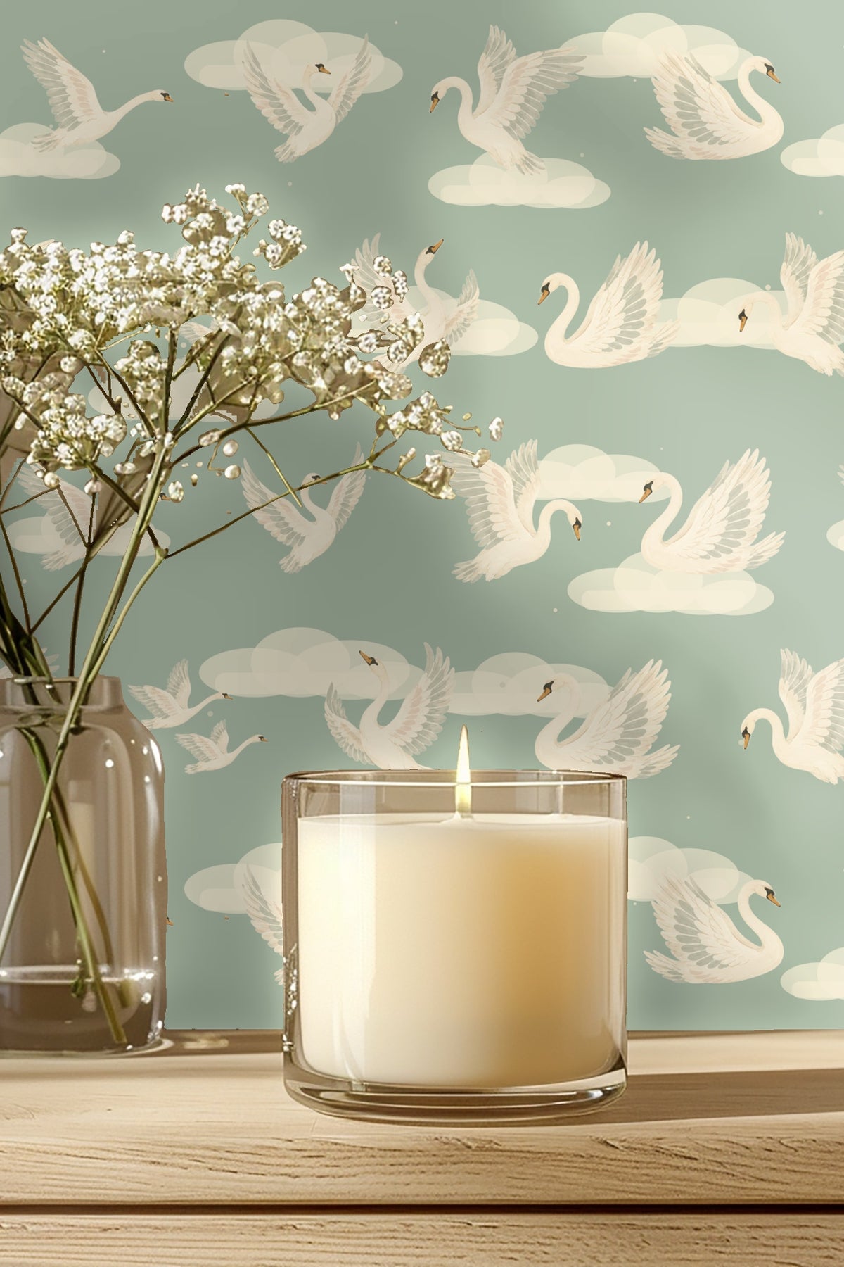 Bedroom scene with green bedframe against wall covered in Celestial Swans Wallpaper
