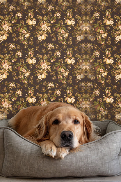 Styled vignette of Veridian Orchard wallpaper with an accent chair and small table