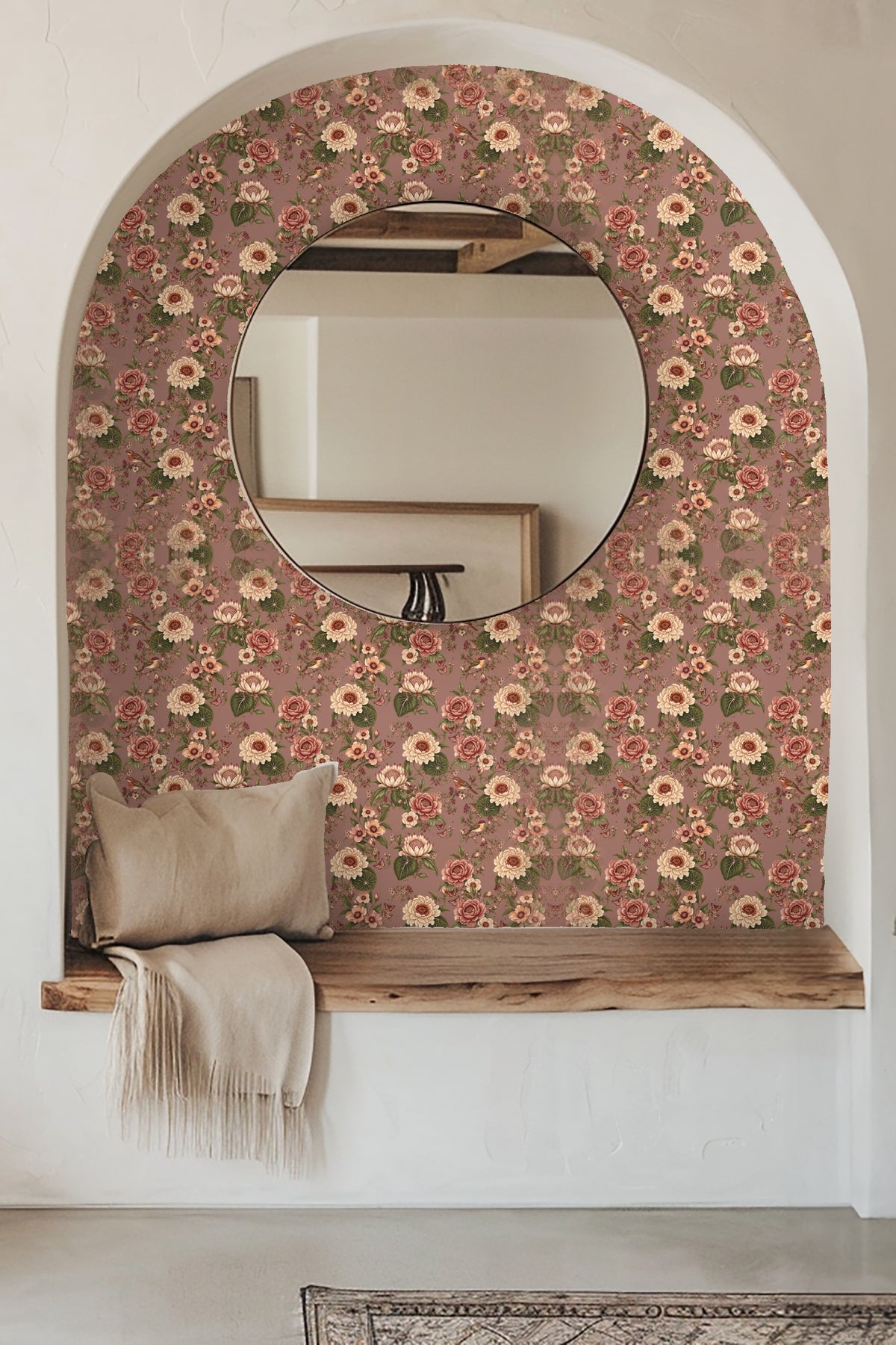 Detailed floral wallpaper pattern on dusty mauve background with beige and dusty rose blooms and olive leaves.