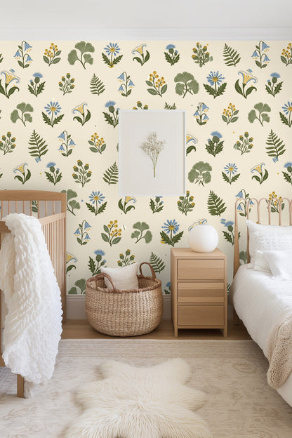 Seamless botanical wallpaper pattern with bluebells, daisies, ferns, and berries on cream background