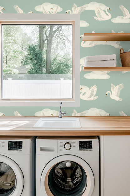 Detailed view of swans with outstretched wings on wallpaper