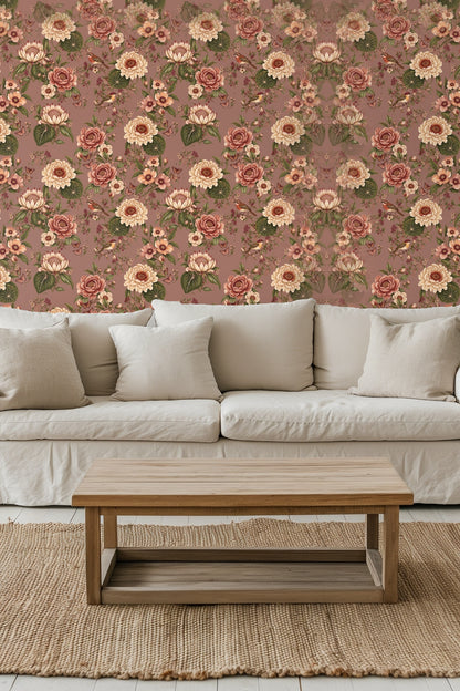 Entryway alcove wallpapered with Autumn Reverie floral design surrounding a round mirror over a wooden bench with neutral cushion and throw.