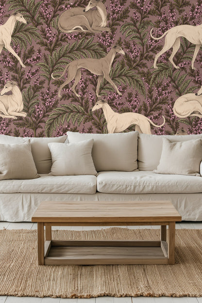 Room interior with Heather Hounds wallpaper behind a textured wood sideboard, framed art, and table lamp