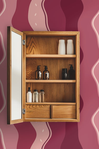 Close-up of Rubella Flux wallpaper in a styled room with wooden ladder and soft blanket