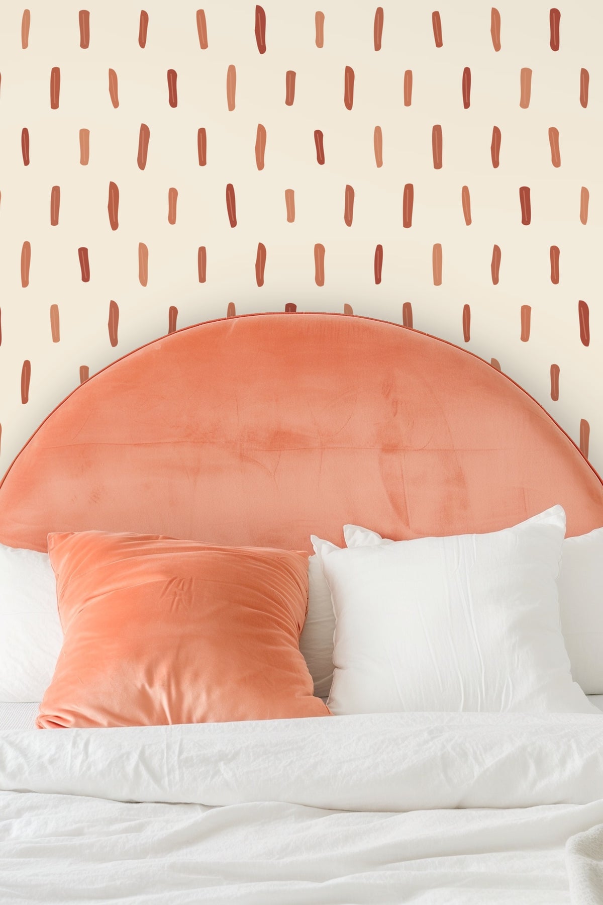 Decorative terracotta stroke wallpaper behind modern mid-century style wooden chair.