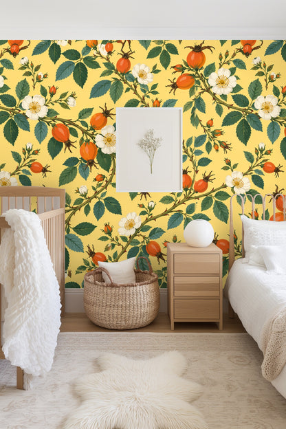 Bedroom with green bedframe and rosehip scroll wallpaper backdrop