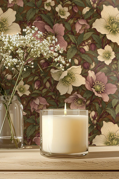 Close-up of intricate hellebore flower wallpaper in cream and dusty rose on terracotta background.