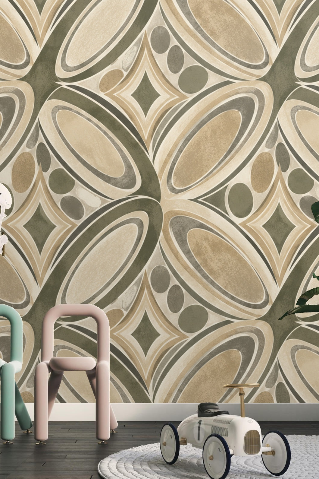 Bedroom scene featuring taupe and olive geometric wallpaper with decorative objects on a side table