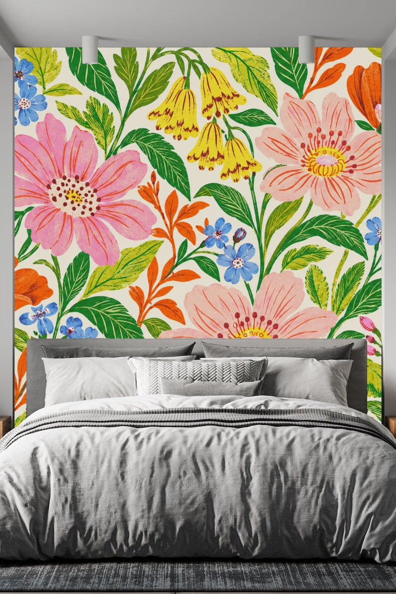 Close-up of wallpaper detail with painterly pink flowers and yellow bell-shaped flowers.