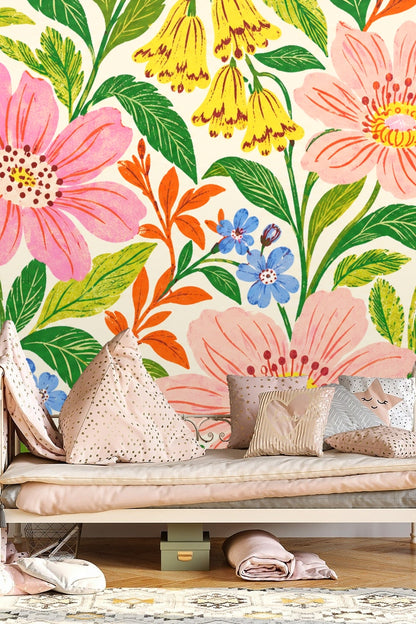 Zoom on orange and pink flower petals accented by refreshingly bright greenery.