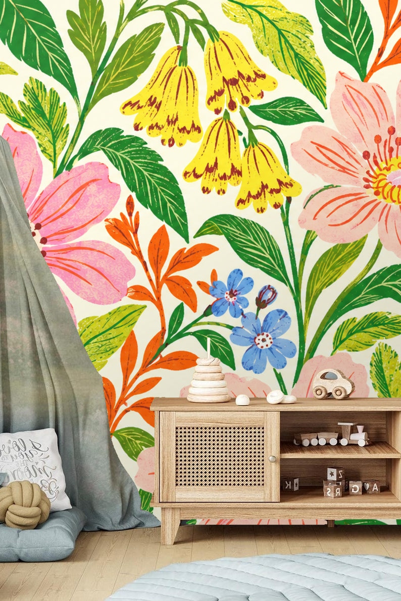 Room with wallpaper mural behind bed featuring large botanical pattern in bright colors.