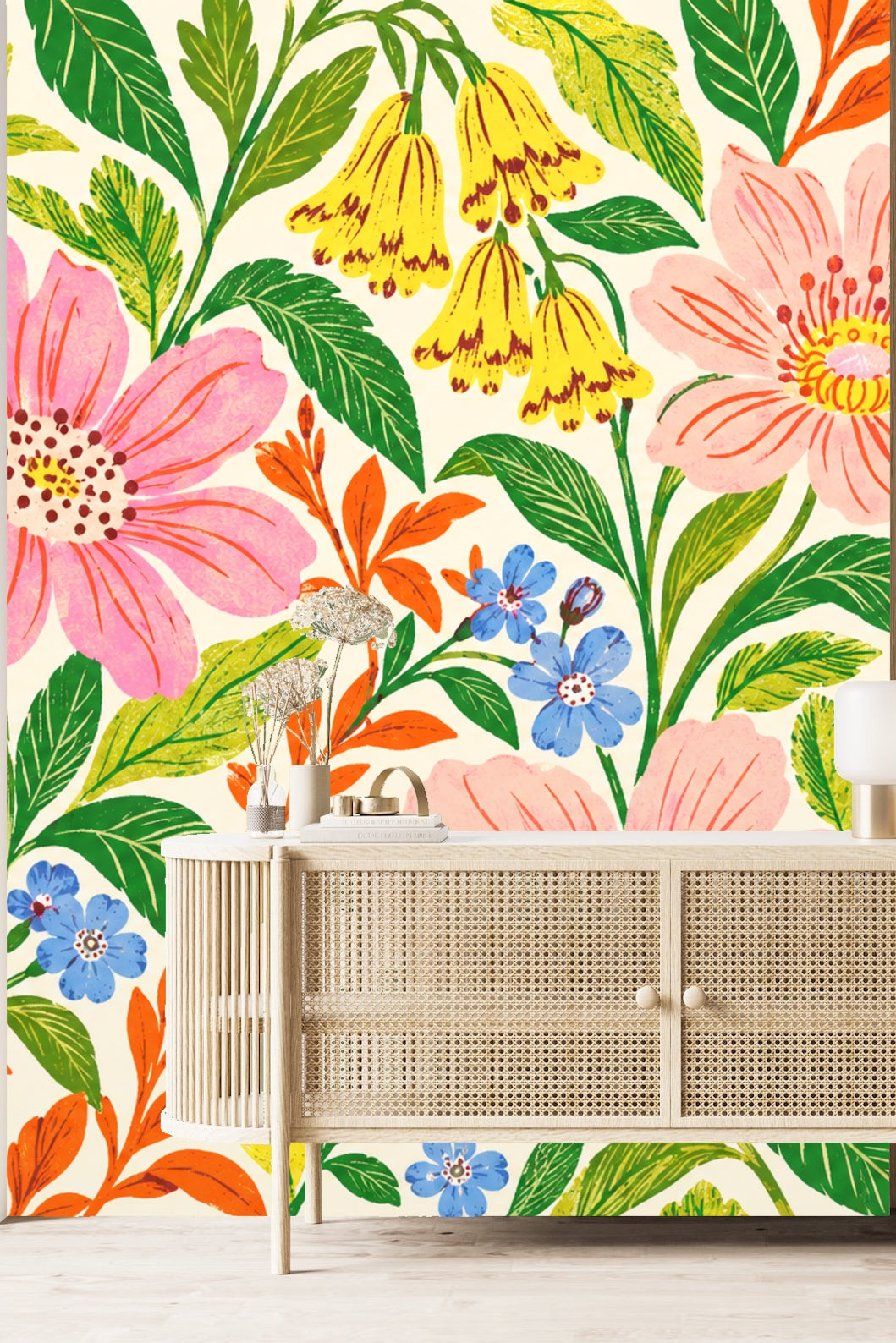 Wide shot of a bedroom with an accent wall fully wrapped in flower and leaf wallpaper.