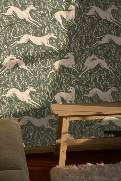 Partial view of wallpaper pattern showing a greyhound with head turned back against the green laurel foliage