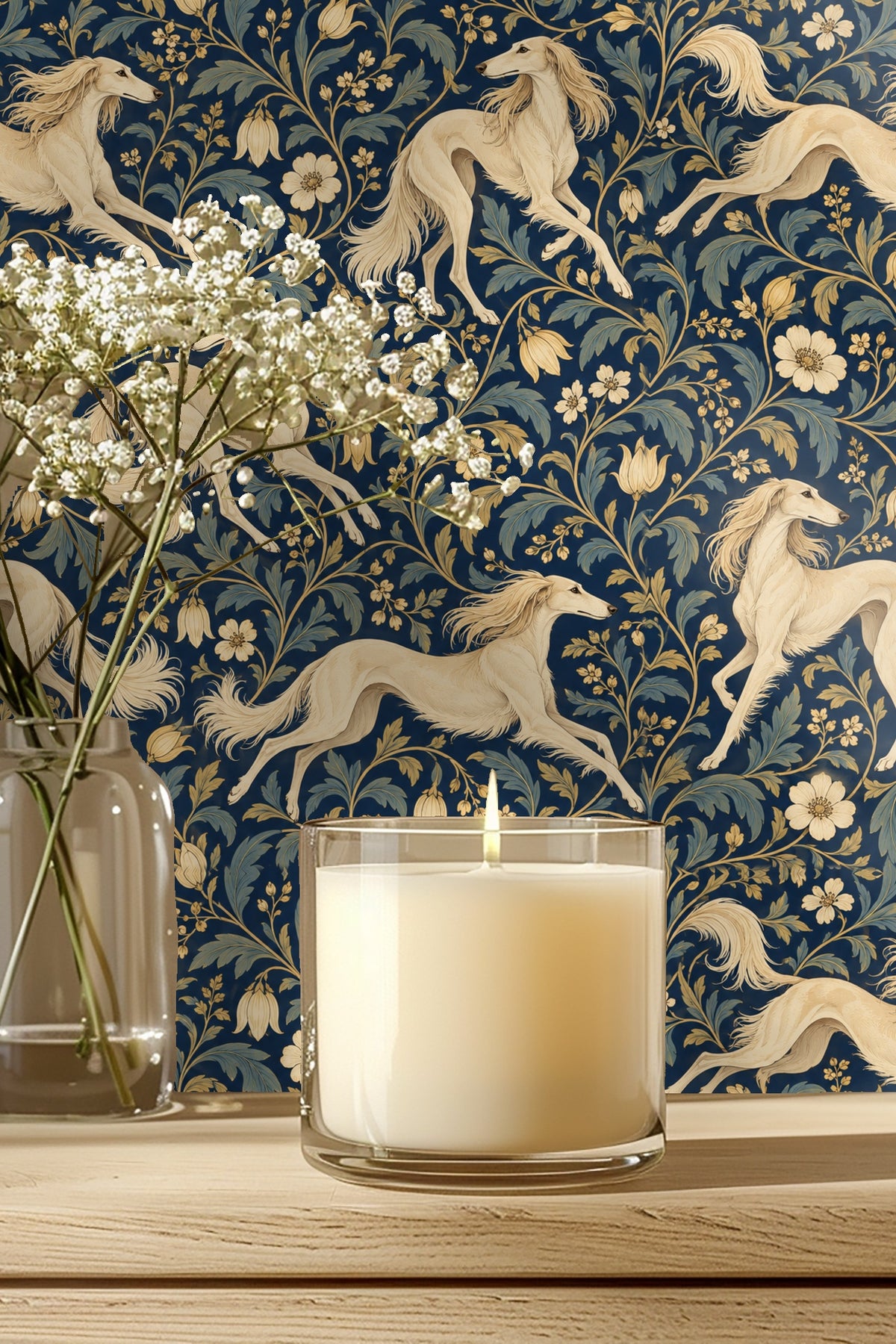 Entryway corner with arched niche wallpapered in navy wallpaper featuring cream Salukis and gold florals, with a round mirror reflecting the