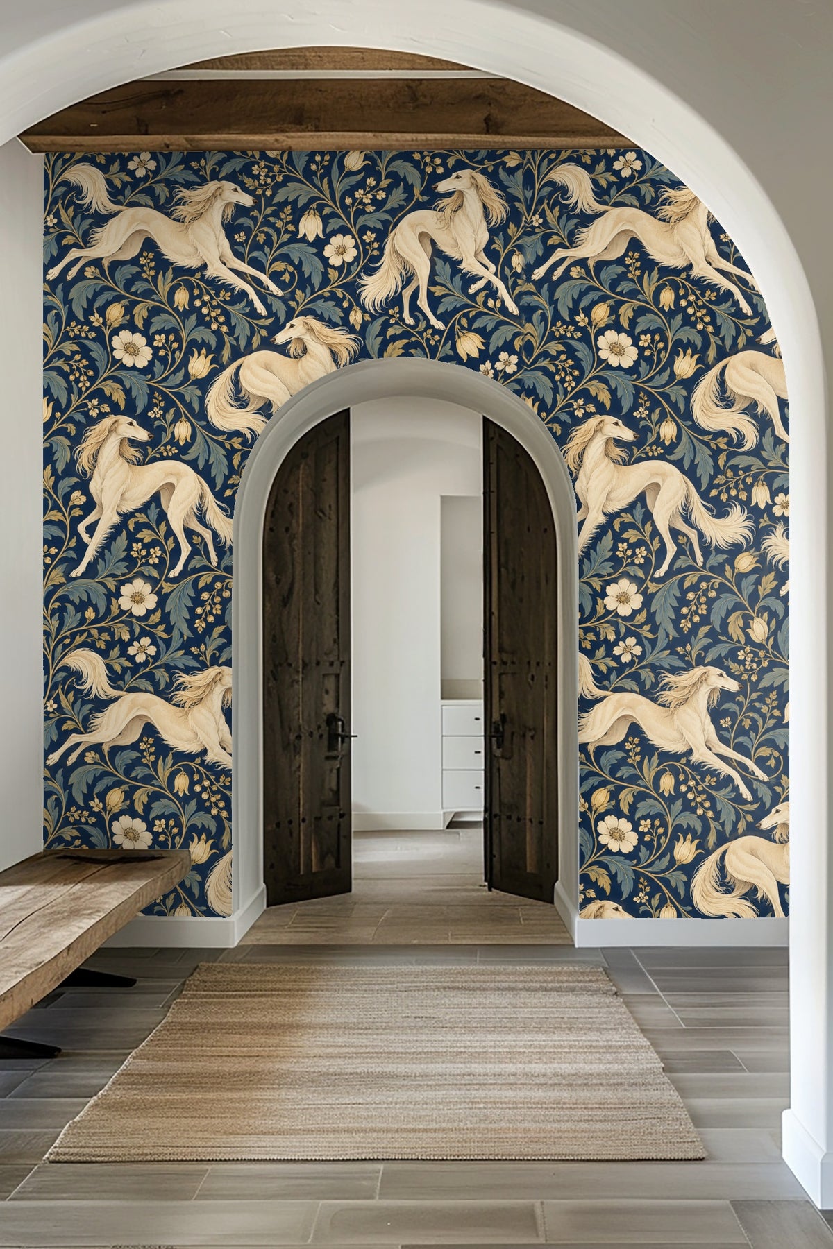 Partial view of navy blue and gold dog floral wallpaper showing cream Saluki dog in mid-leap