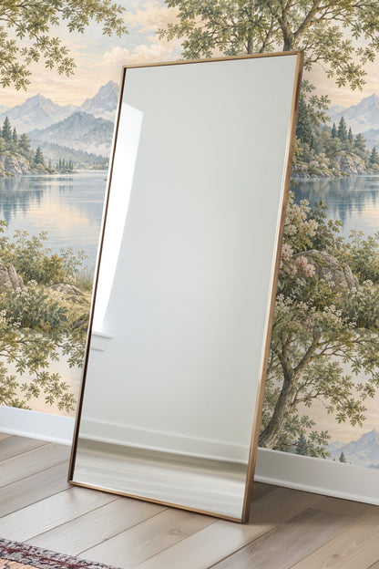 Distant blue-gray mountains with soft clouds in the wallpaper design