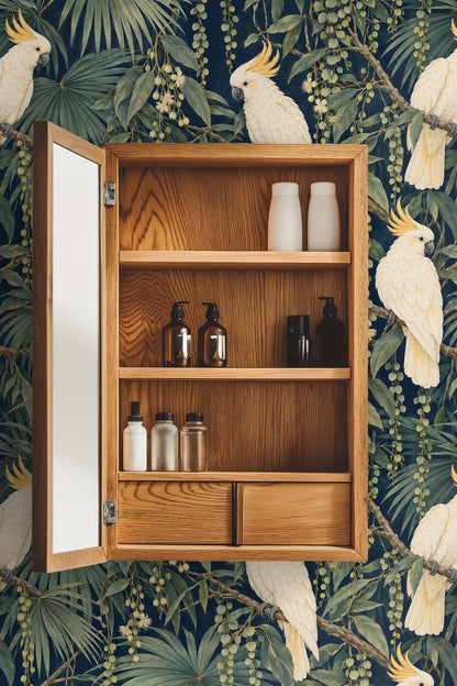 Close-up of delicate palm fronds and seed pods on wallpaper with perched cockatoos