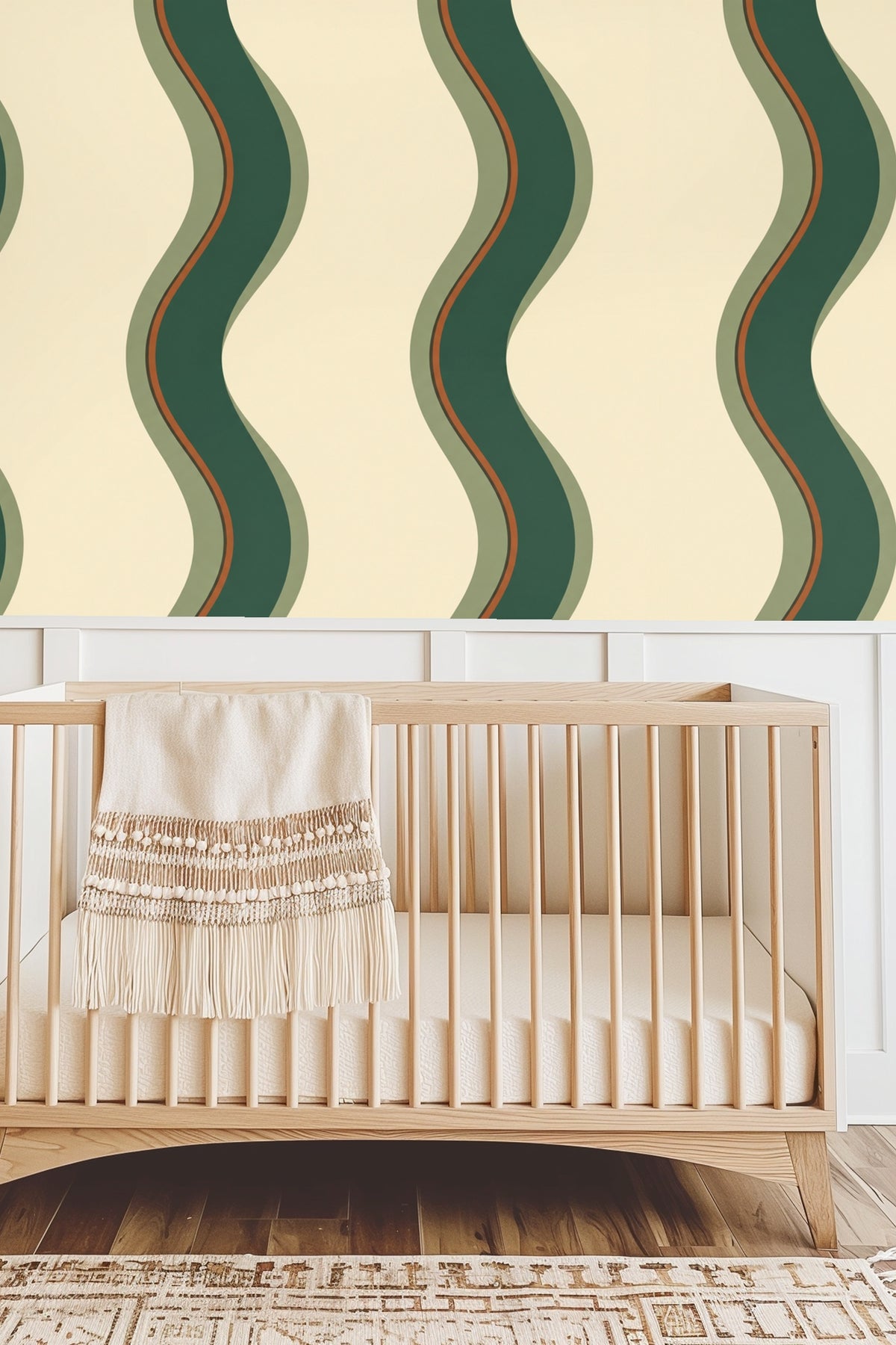 Modern seating area with leather chair and wallpaper of green and rust sinuous vertical stripes.
