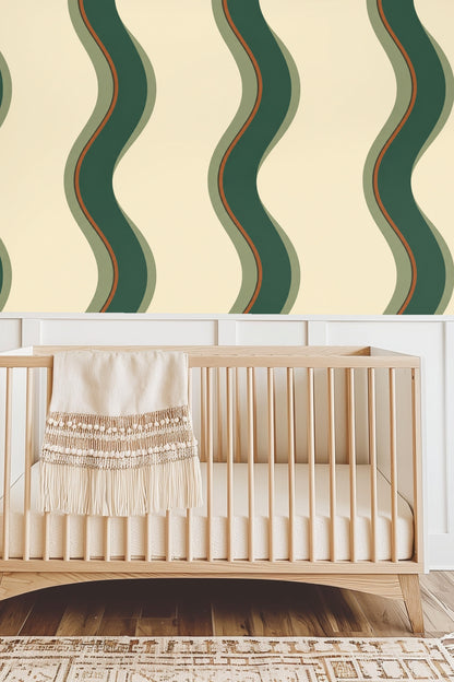 Modern seating area with leather chair and wallpaper of green and rust sinuous vertical stripes.