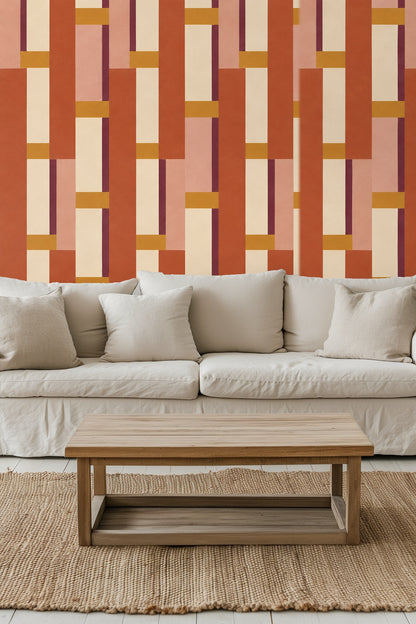 Segmented rectangular pattern in terracotta and rose shades with accent bars of ochre