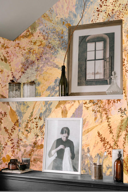 Wild grasses and floral seed heads in muted, natural tones on wallpaper