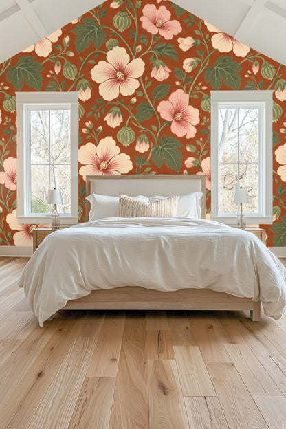 Close-up of flower buds and hibiscus petals in soft blush tones against warm russet