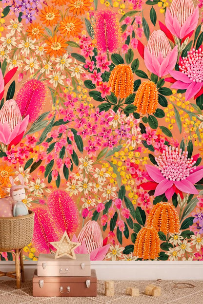 Detailed view of tropical floral wallpaper artwork with bright pink and orange blooms