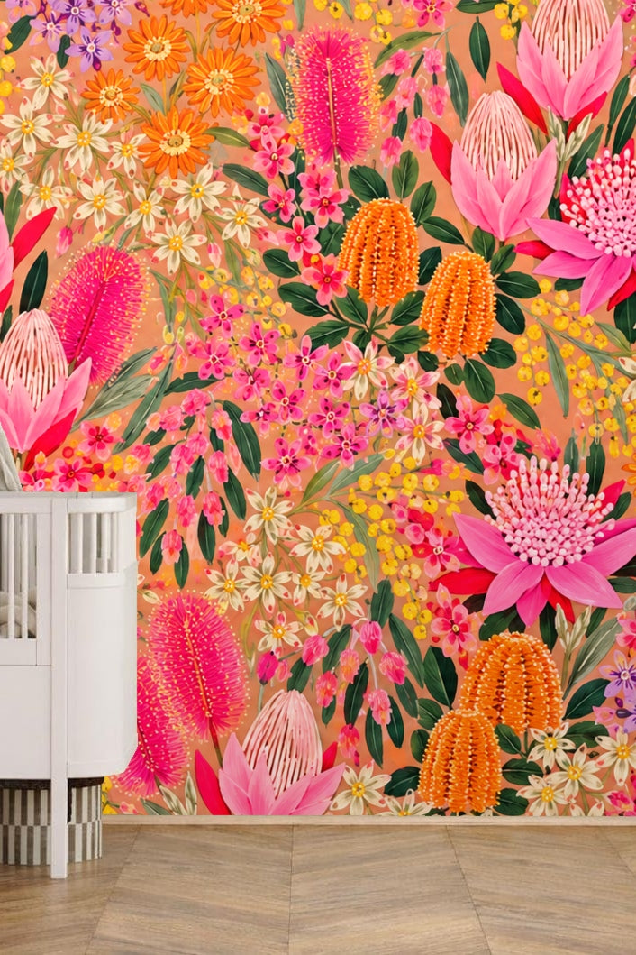Green leafy stems weaving through fiery floral wallpaper composition