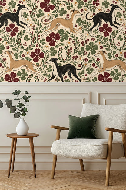 Fawn greyhound mid-leap surrounded by botanical elements on wallpaper.