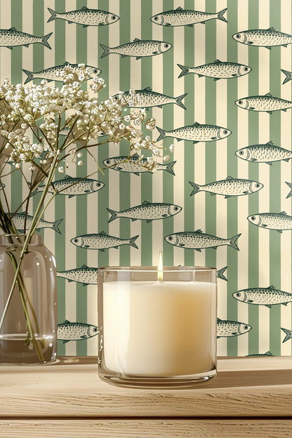 Entryway with arched dark wood doors framed by playful sardine and stripe wallpaper