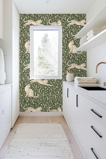 Pattern repeat showing four tabby cats in resting and leaping poses surrounded by garlands.