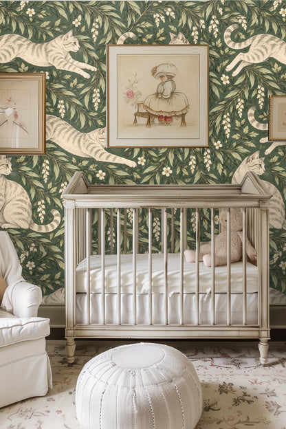 Close-up detail of tabby cat figure among green leaves and white flowers on wallpaper.