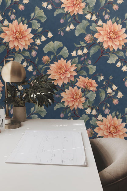 Close-up of dusky dahlia wallpaper showing bell-shaped blossoms and large foliage detail.