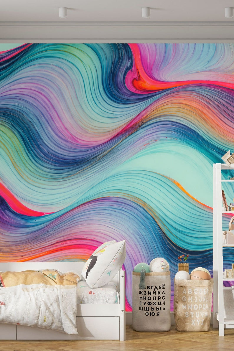 Close-up view of flowing multicolor ribbons in teal, pink, and orange hues with fine line textures.