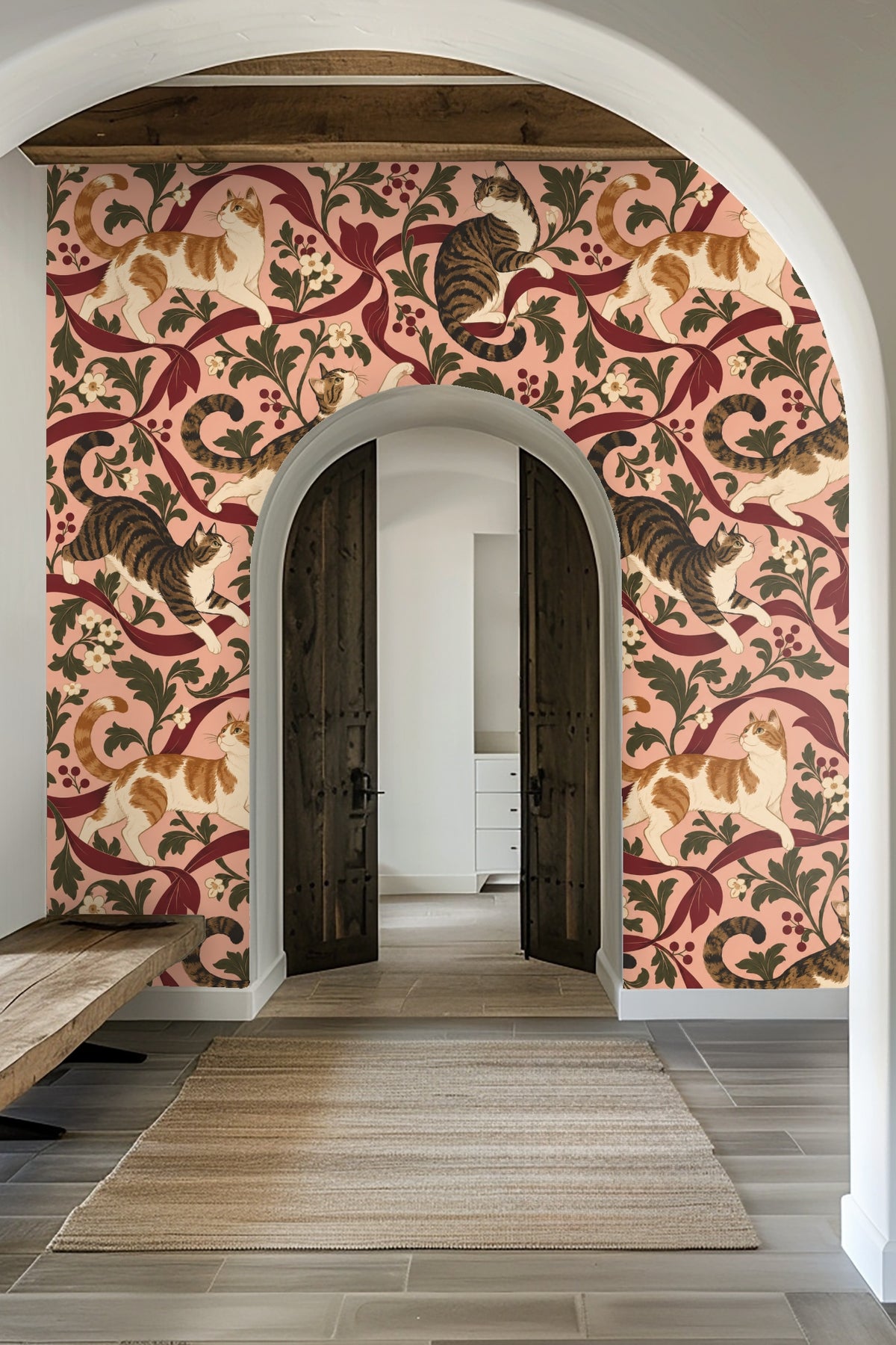 Entryway featuring wallpaper with playful tabby cats and crimson ribbons against a pink backdrop framing wooden arched doors.