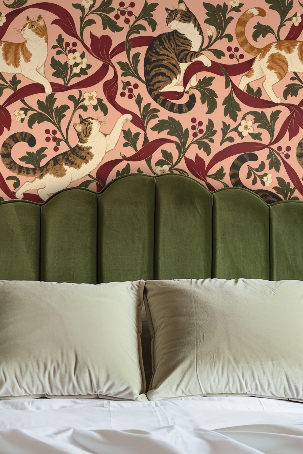 Detail of wallpaper border with smooth, undulating crimson ribbons intertwining with green leaves and cats.