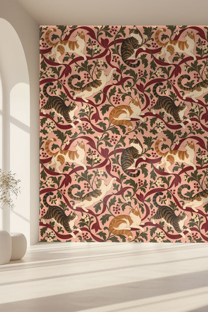 Nook decorated with wallpaper showing playful tabby cats incised with soft linework on muted pink background.