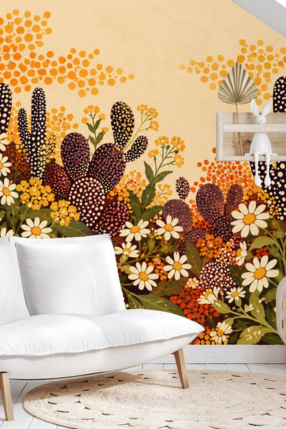 Close-up of floral and cactus wallpaper pattern showing clustered wildflowers and spotted succulents on a beige backdrop