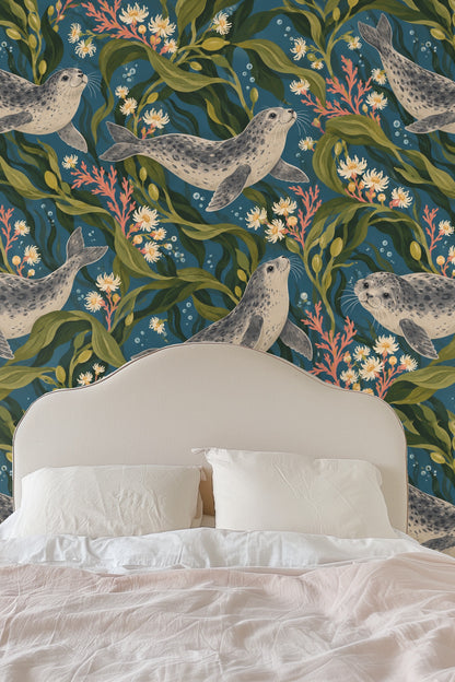 Living room with plush pink sofa and harbor seal wallpaper mural featuring green kelp and coral pink flowers