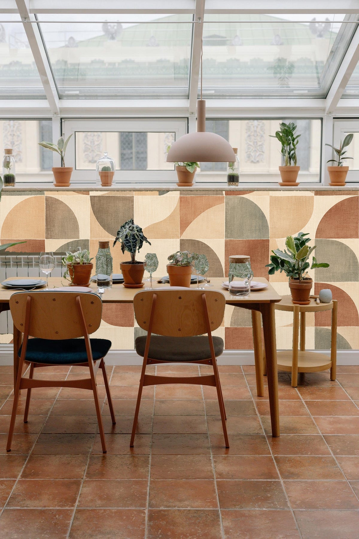 Terracotta Arc Mosaic wallpaper shown in an interior setting