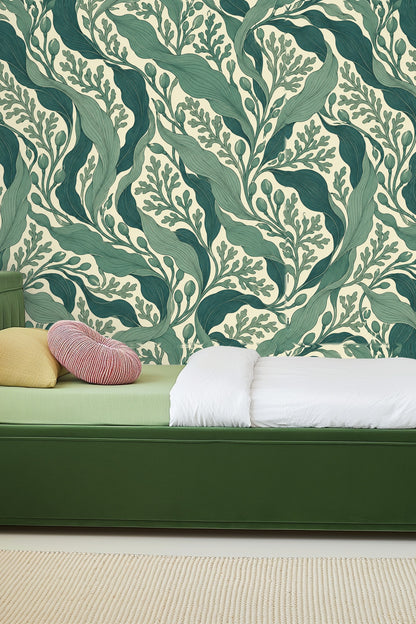 Interior vignette with modern furniture against dramatic leafy wallpaper.