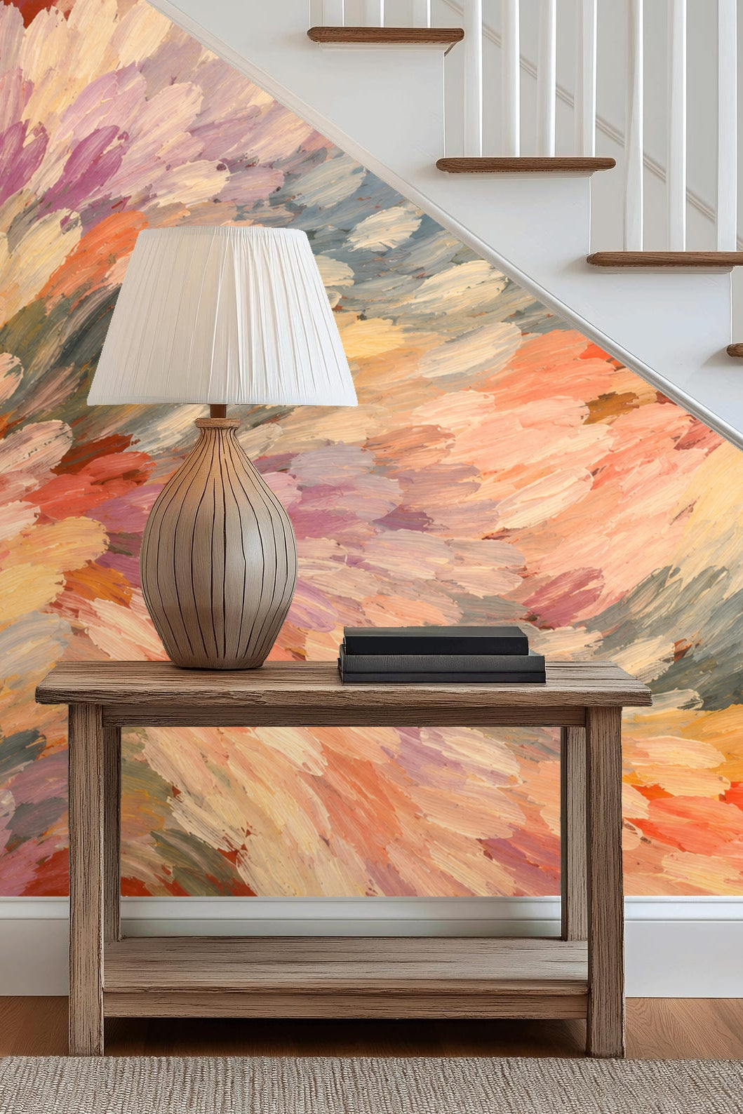 Bedroom with a large headboard wall covered in dynamic pastel brushstroke wallpaper in peach, coral, and blue hues.