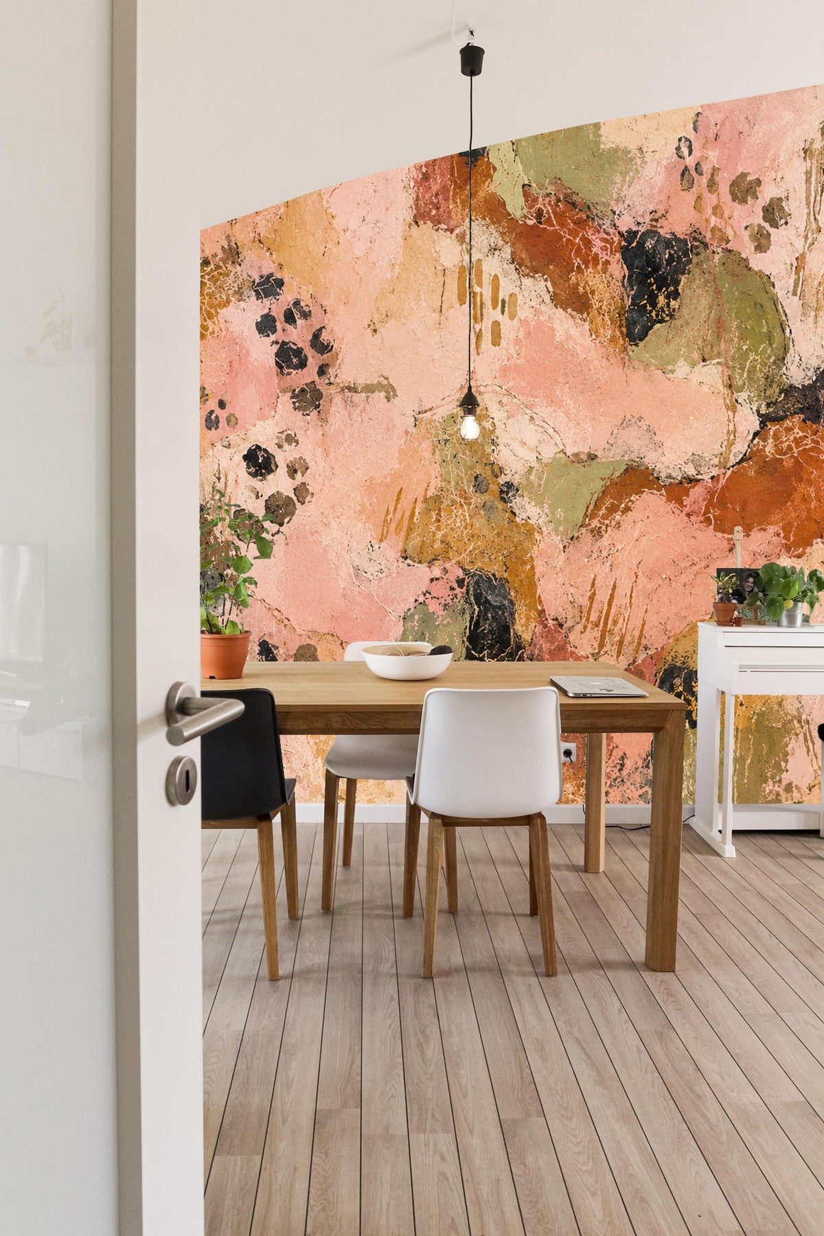 Interior wall featuring mosaic wallpaper adding warmth with layered earth tones