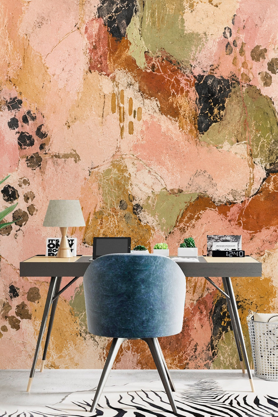 Wall detail portraying soft peach and olive abstract shapes with dark accents