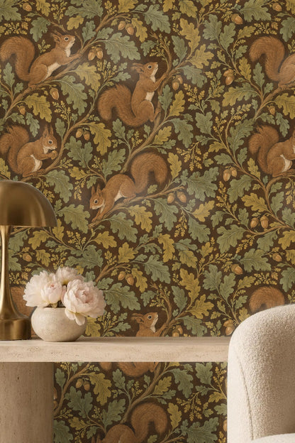 Pattern detail of squirrels and acorns curling across wallpaper surface