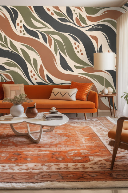 Bold botanical wallpaper pattern with flowing terracotta and green leaves on cream background