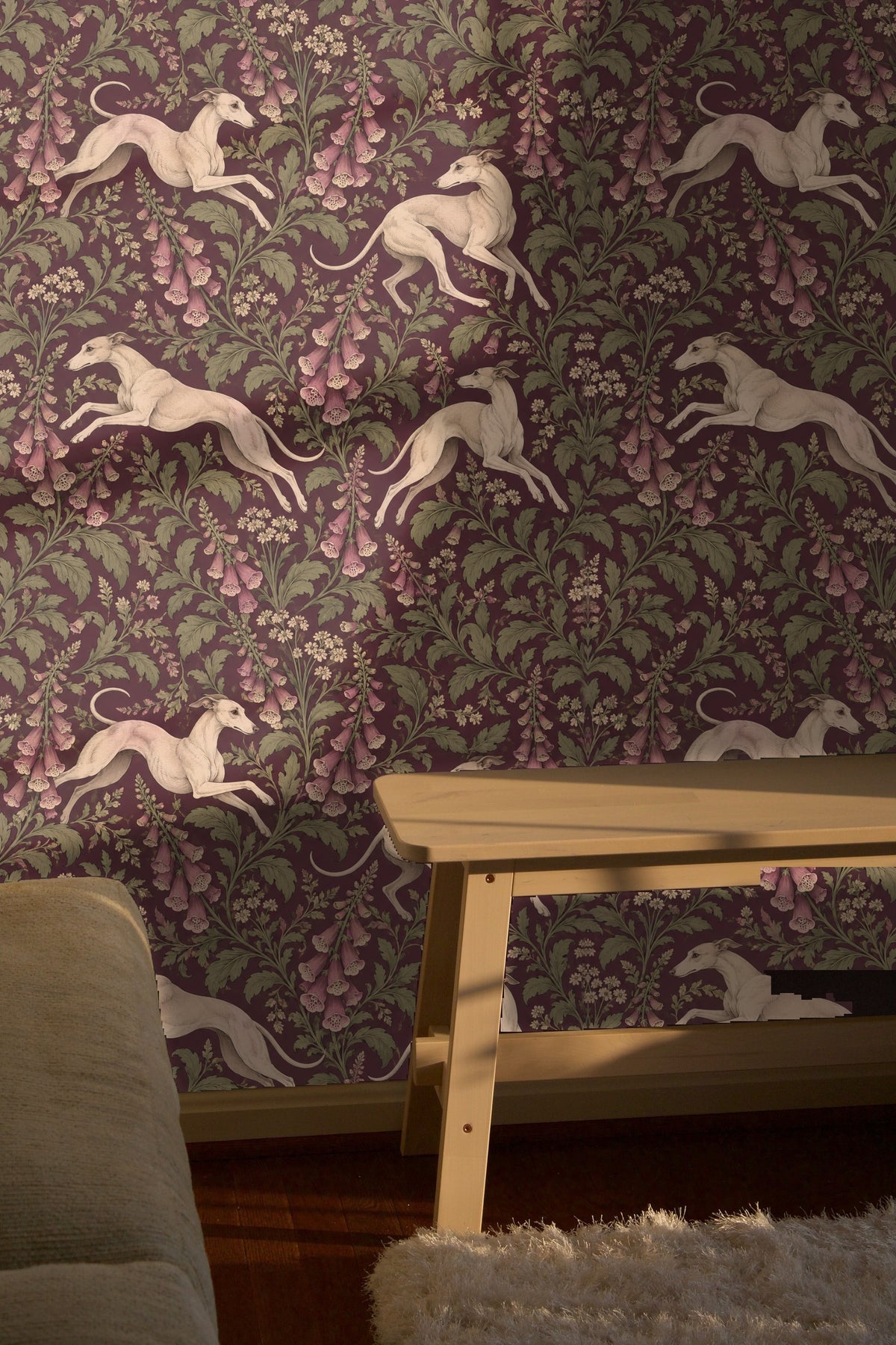 Floral foxglove stems with bell-shaped blossoms in mauve tones on dark plum.